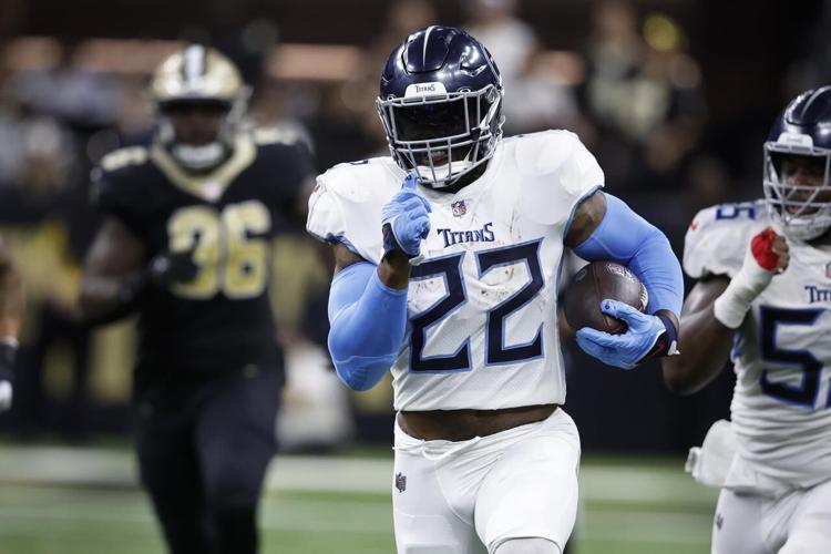 Derrick Henry of the Tennessee Titans rushes in the first half of an