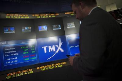 S&P/TSX composite up, U.S. stock markets down in late-morning trading