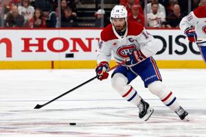 Montreal Canadiens captain Nick Suzuki wins Selke Trophy, teammate Cole Caufield takes Lady Byng