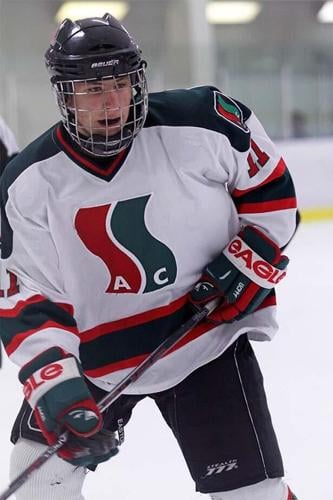 Alberta minor hockey player dies after taking puck to throat - The