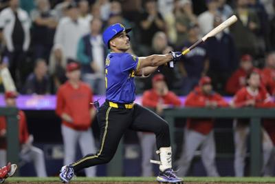 Touted rookie Harry Ford delivers off bench as Mariners top Angels in 12 to tie for 1st in AL West