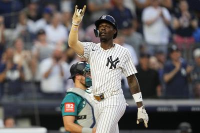 Chisholm homers twice and Schlittler wins MLB debut as Yankees top Mariners 9-6