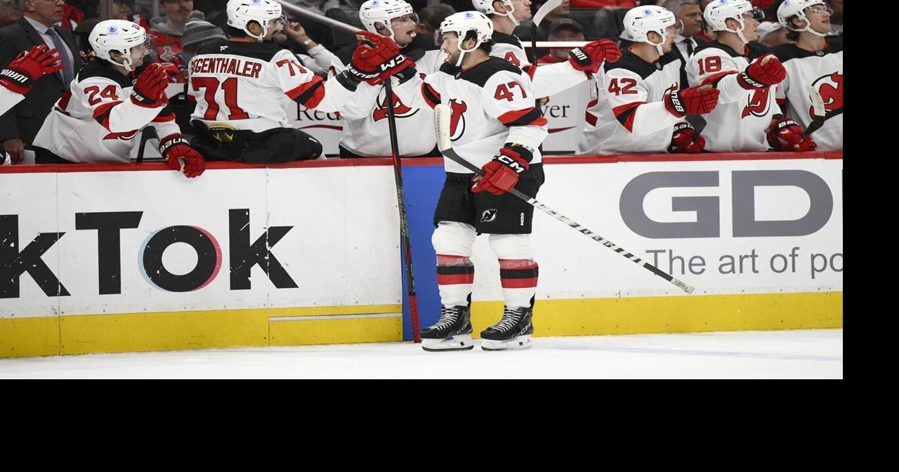 Cotter scores 2 goals to lift Devils over Capitals 5-3