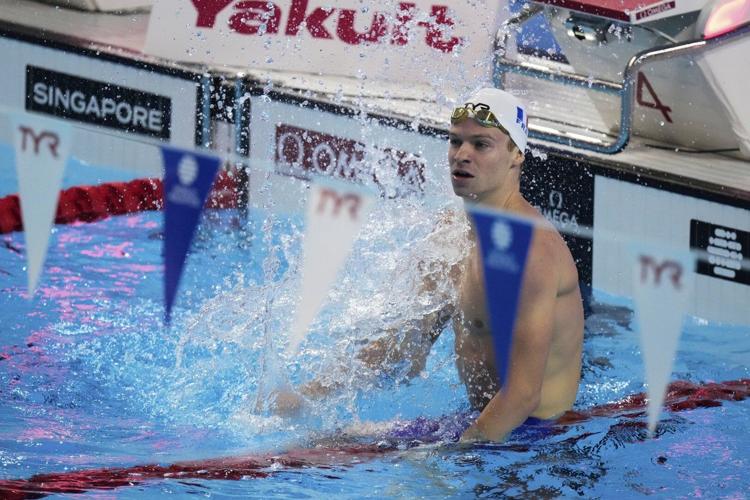 Léon Marchand tries to break his own 200 IM world record at the swim worlds in Singapore
