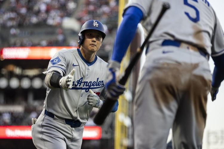Shohei Ohtani hits his 49th homer and Dodgers rally to beat Giants 13-7