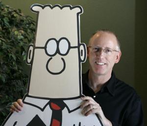 Deir cruthaitheoir an chartúin “Dilbert” go bhfuil an ailse próstatach chéanna aige le Joe Biden