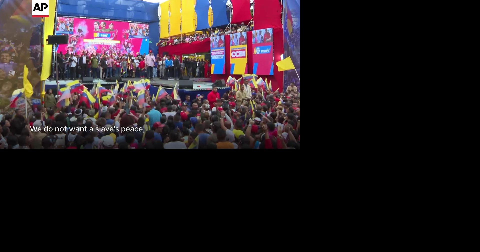 Venezuela's Nicolás Maduro cheers on crowd at rally in Caracas