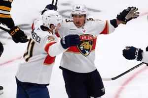 Marchand has 2 assists to help Panthers win 4-3 in his emotional return to Boston