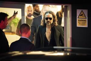 UK police charge comedian Russell Brand with rape and sexual assault