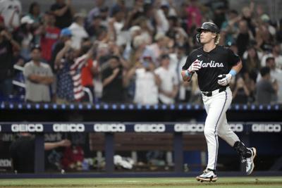 Edwards, Ramírez help Marlins come from behind to beat Yankees 13-12
