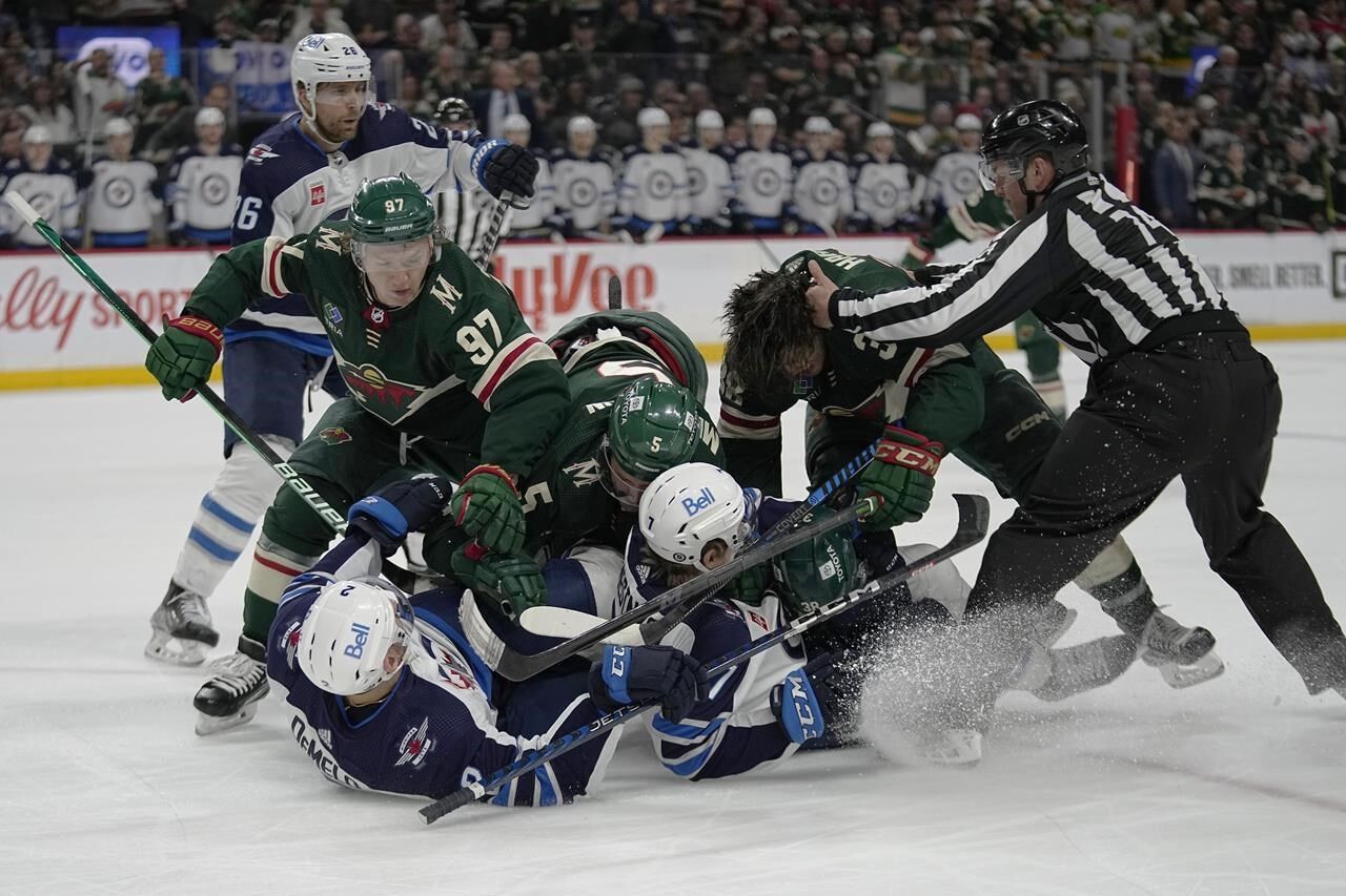 Jets Clinch Playoff Spot With Feisty 3-1 Win Over Wild