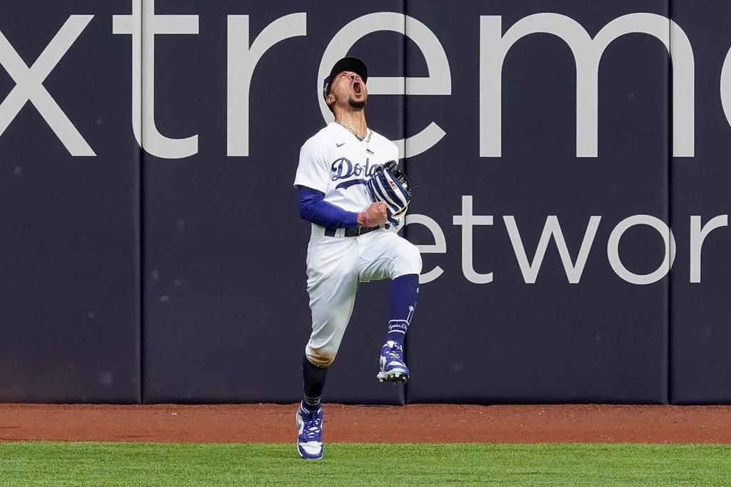 Dodgers outfielder Mookie Betts' reaction after robbing Atlanta's Marcell  Ozuna of a big hit was almost as special as his catch. For a…