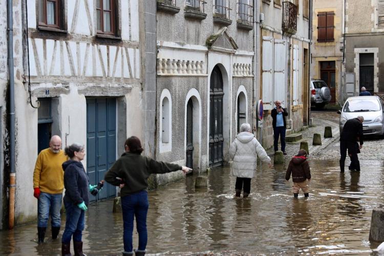 Storm aftermath leaves 2 dead in France; flood alerts to remain Saturday