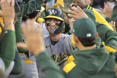 Jacob Wilson comes home to Los Angeles and leads Athletics' 18-hit attack in 11-1 rout of Dodgers