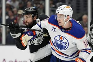 Kings blow a 4-goal lead before Danault scores the last-minute winner in 6-5 opening win over Oilers