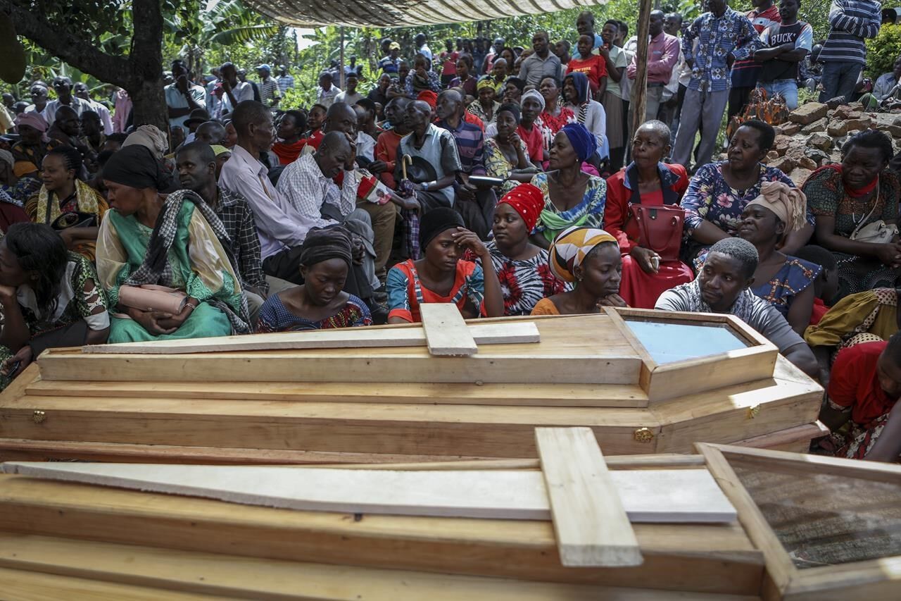 Ugandan Border Town Buries Victims Of Rebel Massacre That Left 42 Dead ...