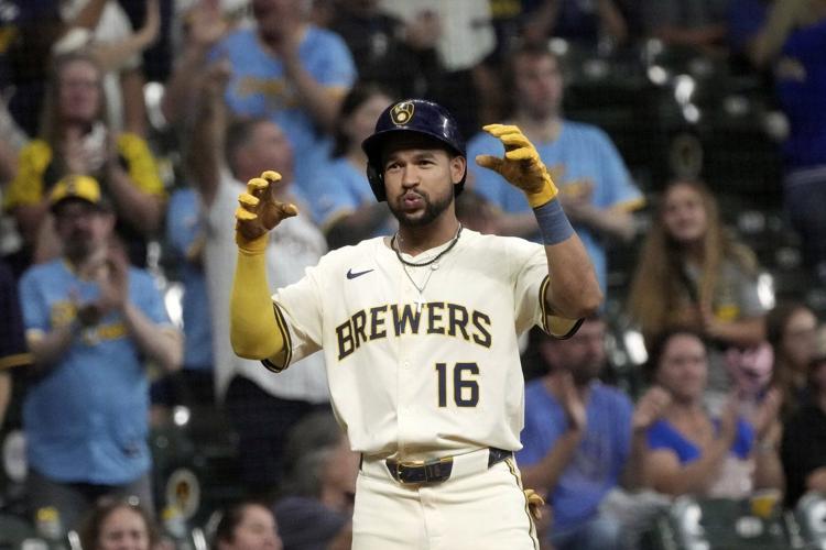 Rested Woodruff has solid start and Perkins drives in 5 to lead Brewers over Angels 9-2