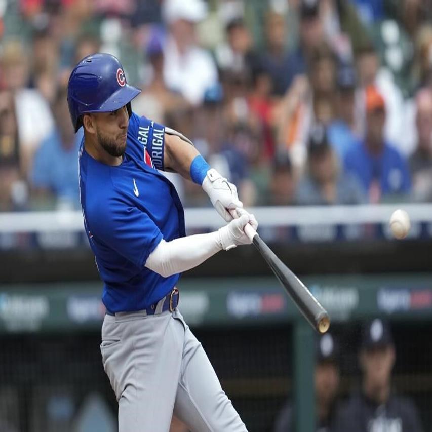 Yan Gomes' single breaks an 8th-inning tie as the wild card-contending Cubs  beat the Tigers 6-4