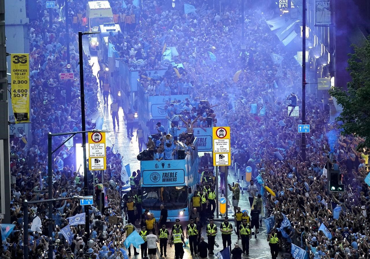 Manchester City celebrates winning treble of major trophies with
