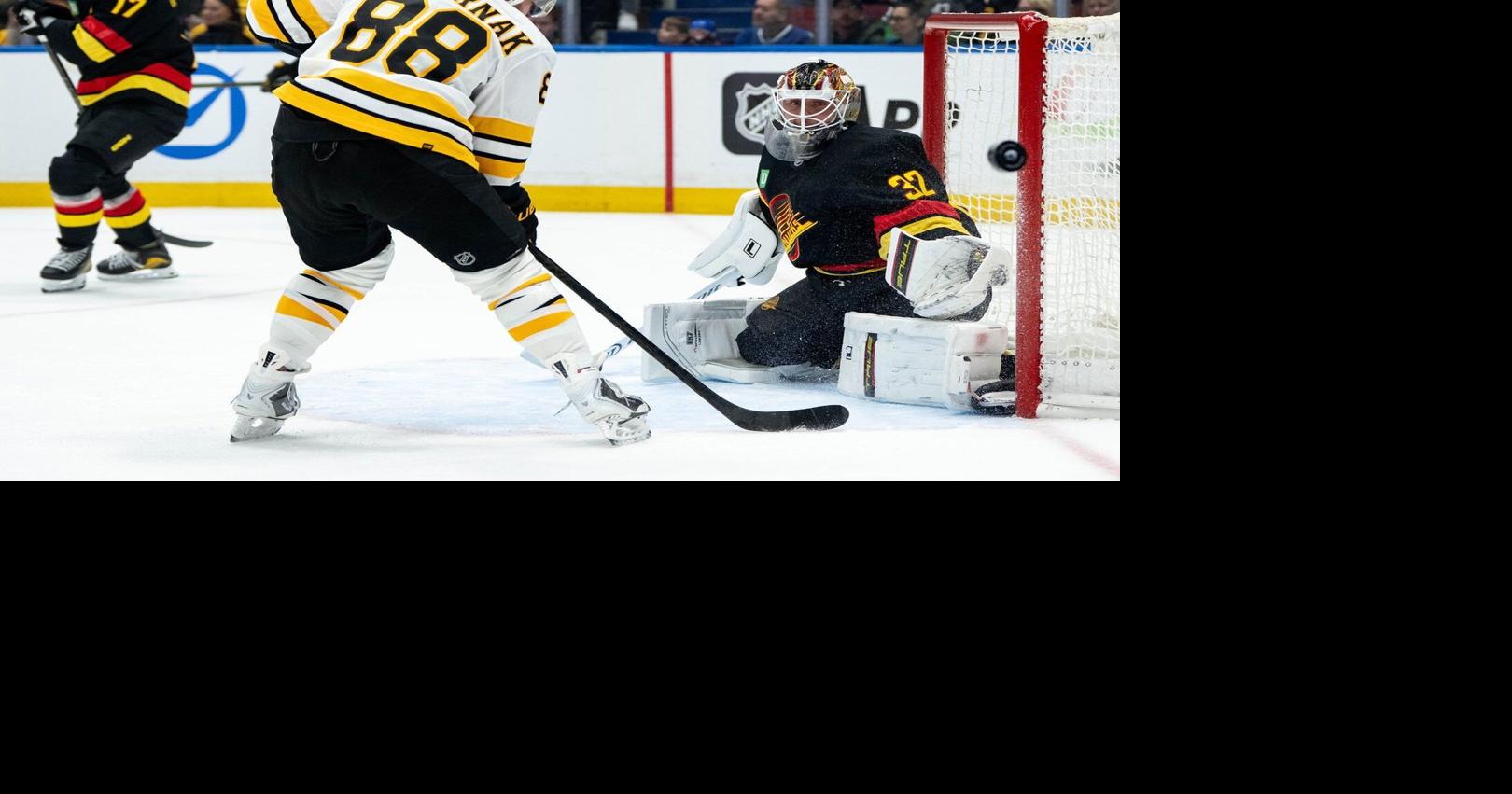 Minten scores in overtime, Boston Bruins top Vancouver Canucks 3-2