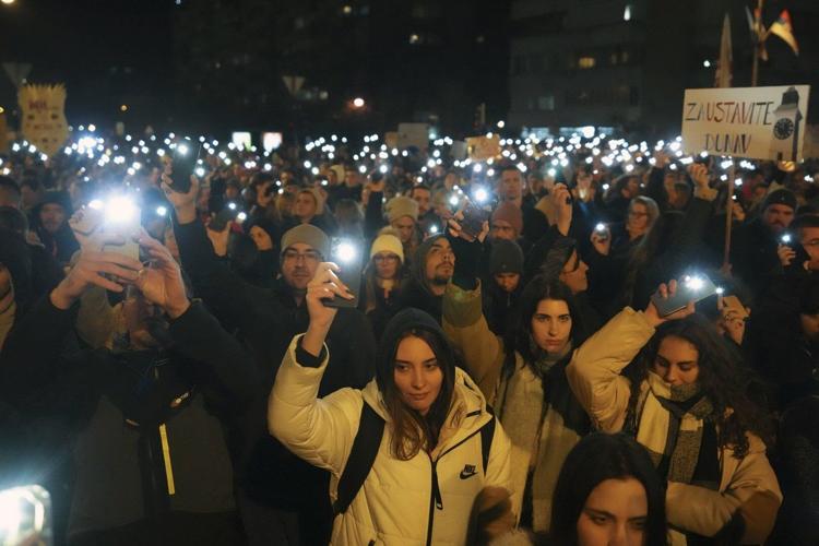 Serbian students hold overnight bridge blockade 3 months since deadly
