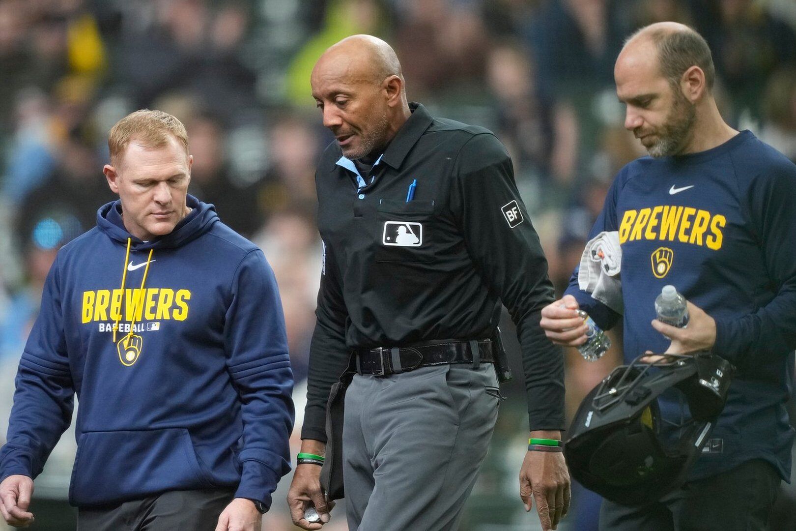 Umpire C.B. Bucknor leaves Rays-Brewers game after foul tip strikes him ...