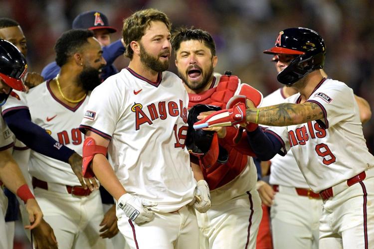 Schanuel walks with bases loaded in 9th to lift Angels over Rangers 6-5