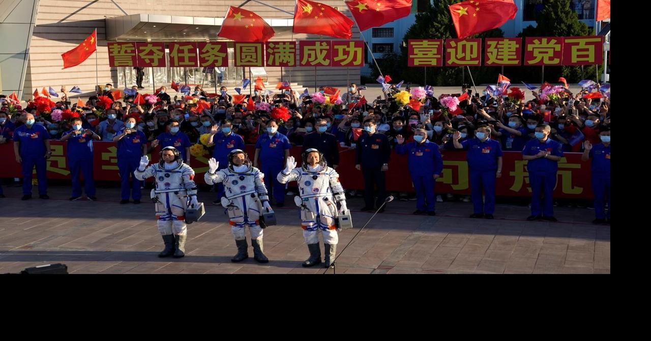 China launches first three-man crew to new space station