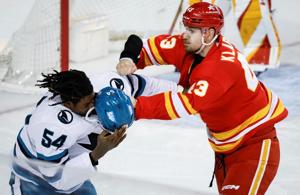 Calgary Flames re-sign forward Klapka, defenceman Kuznetsov
