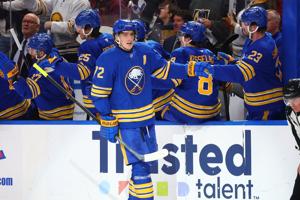 Thompson honored for Olympic gold-medal win, then scores in Sabres' 3-2 victory over Golden Knights.