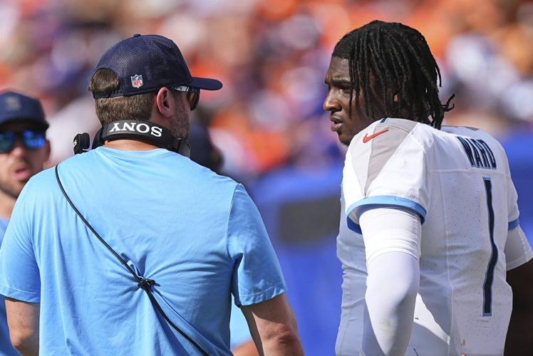 Denver #39 s defense swarms top overall draft pick as Titans #39 Cam Ward