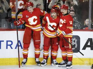 Flames rookie Honzek out six months after surgery for upper-body injury