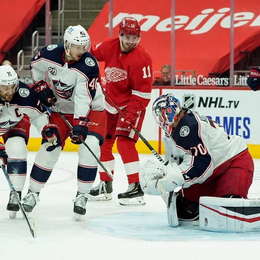 Blue Jackets hold on, defeat Red Wings 3-2 for their 1st win