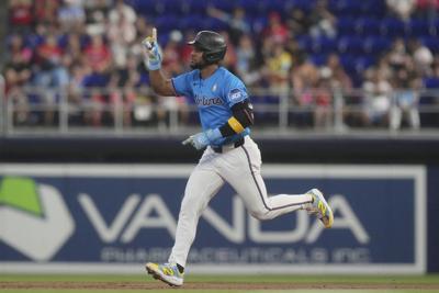 Otto López homers twice, Marlins beat Phillies 5-4 to avoid 3-game sweep