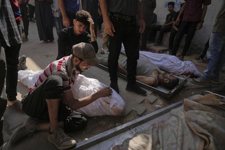 Dozens killed seeking aid in Gaza as Israel weighs further military action