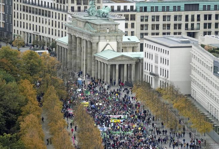 Campaigners stage climate protests across continents