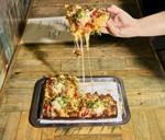 1_Descendant Detroit Style Pizza_A cheesycrusted focaccialike pi