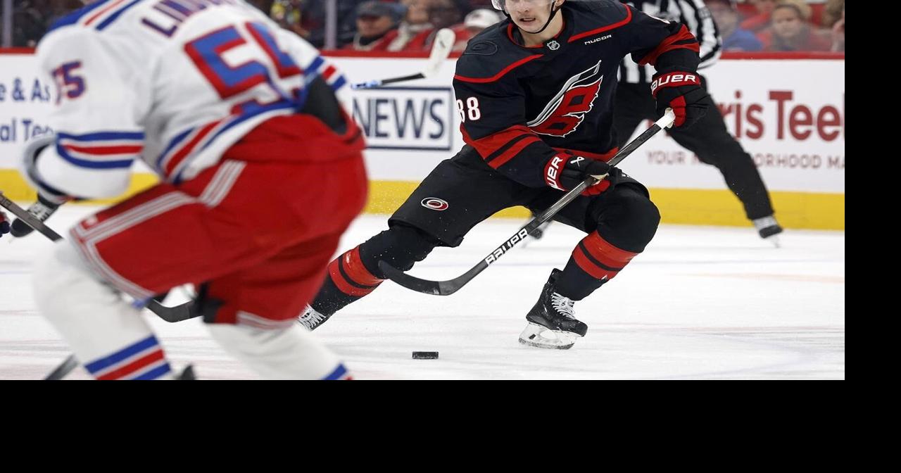 Hurricanes rally to beat Rangers 4-3 extending home win streak to nine