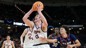David Mirkovic has 29 points and 17 rebounds to lead No. 3 Illinois to 105-70 rout of No. 14 Penn