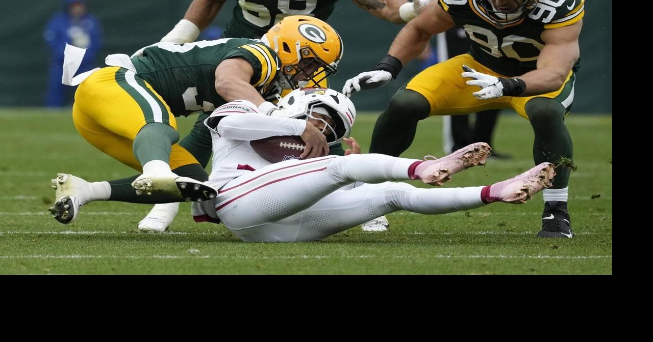 Doubs catches 2 TD passes in his return from a suspension to help Packers rout Cardinals 34-13