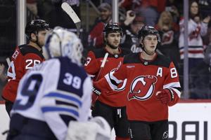 Jack Hughes scores 2, brother Luke has 3 assists as Devils stuns Jets 4-1