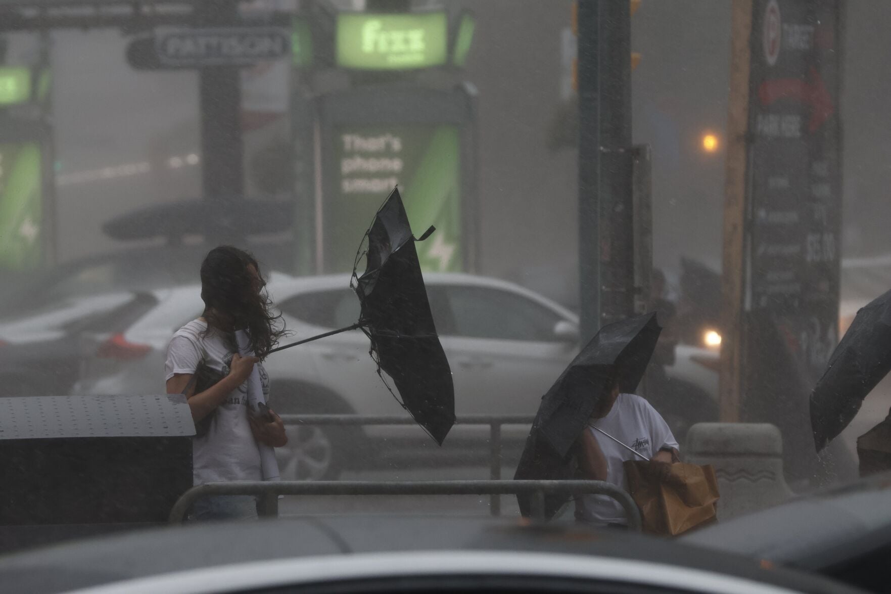 Severe thunderstorms hit Toronto and southern Ontario, flooding streets, knocking out power for 45,000, and disrupting flights and events