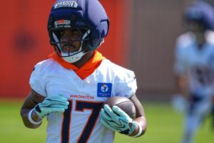 Quiet moments at Broncos camp after Jaylen Waddle pulls up, Bo Nix gets knocked down. Both are OK