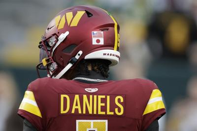 Commanders' Daniels honoring great grandmother with Japanese flag helmet sticker