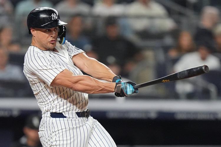 Yankees beat White Sox 5-3 behind Stanton and Rodón to stay tied with for AL East lead