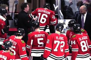 Blackhawks center Jason Dickinson to miss at least a couple games with high ankle sprain
