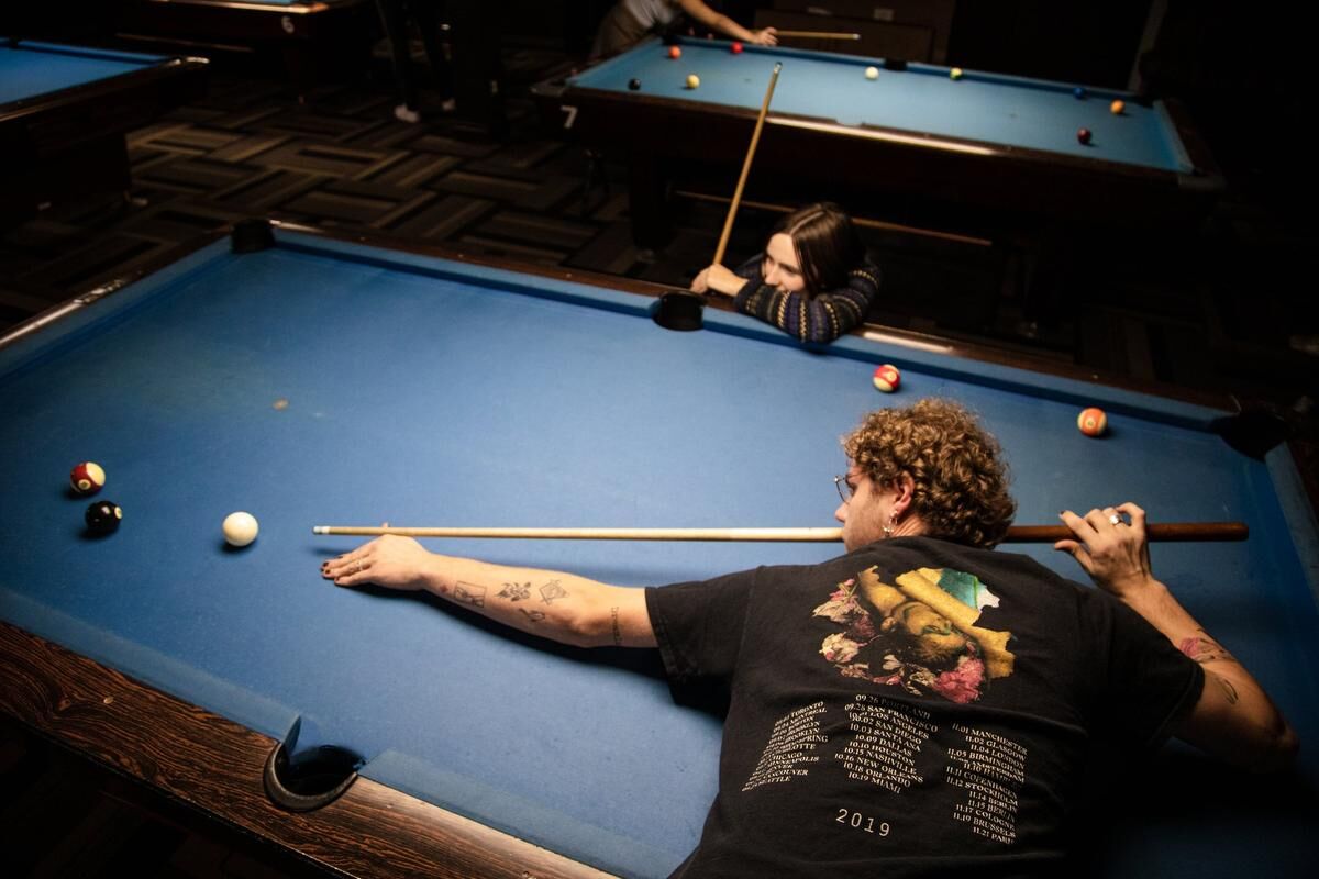 Pool halls are once again thriving in the city