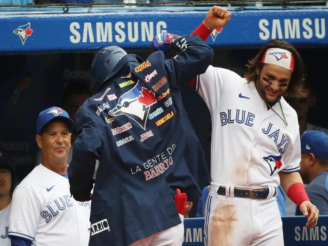 Blue Jays, back in Toronto, battle for AL wild-card, home run jacket