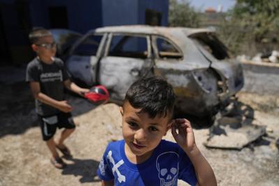 AP PHOTOS: Palestinians report Israeli settler violence in the occupied West Bank
