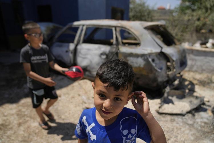 AP PHOTOS: Palestinians report Israeli settler violence in the occupied West Bank